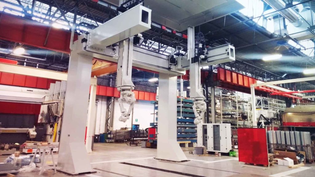 Double carriage gantry with triple axis.